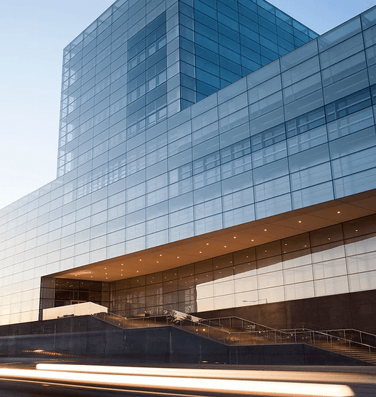 SnapGuard Solutions, LLC building, characterized by its expansive glass exterior.