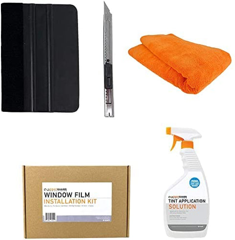 A box containing cleaning supplies: towel, cloth, and spray bottle.